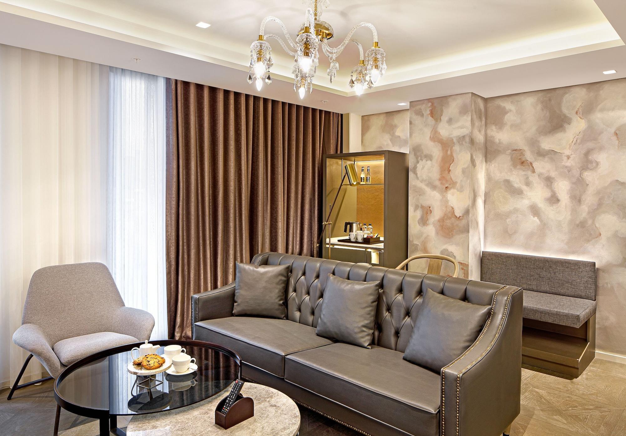 Wanda Vista Istanbul Hotel Exterior foto A living room in a suite at the hotel